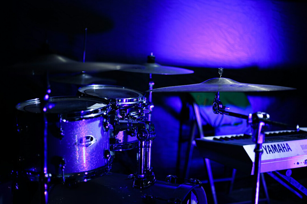Rows of studio lighting rigs above a television set