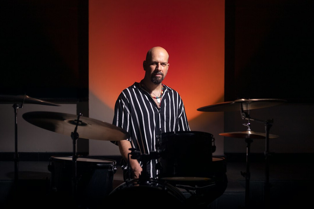 Studio portrait of a man streaming production instructor